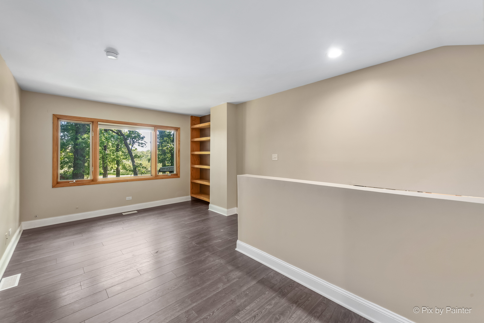 45W447 Lees Road Maple Park, IL 60151 - Photo 11 of 37 an empty room with wooden floor and windows