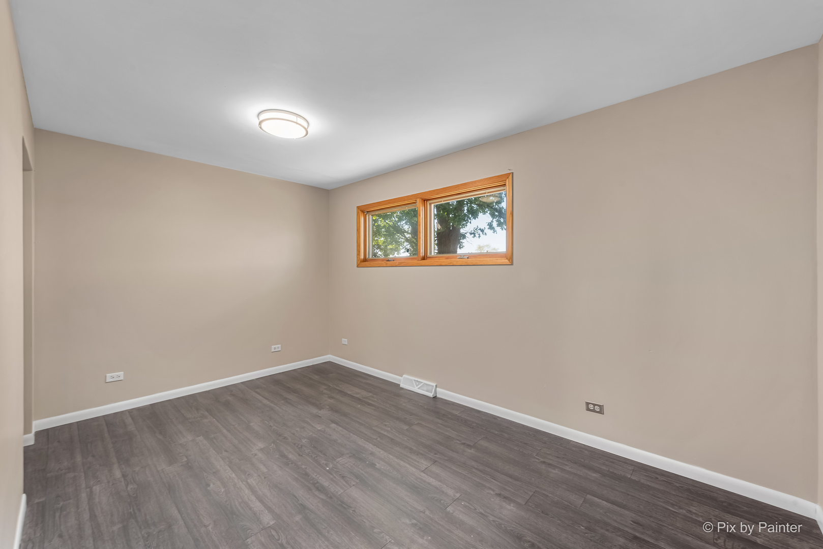 45W447 Lees Road Maple Park, IL 60151 - Photo 12 of 37 a view of an empty room with wooden floor and a window