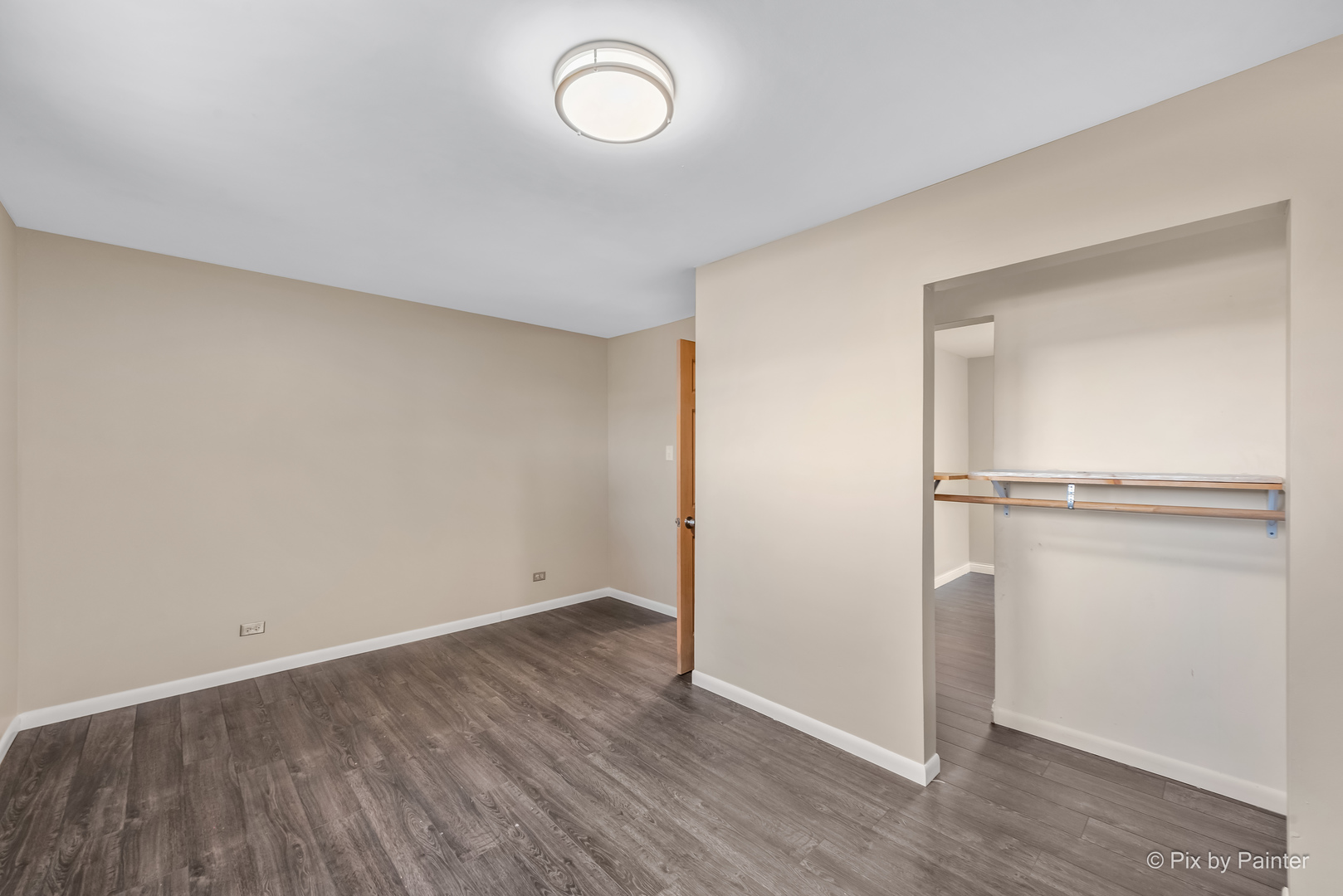 45W447 Lees Road Maple Park, IL 60151 - Photo 14 of 37 an empty room with wooden floor and mirror