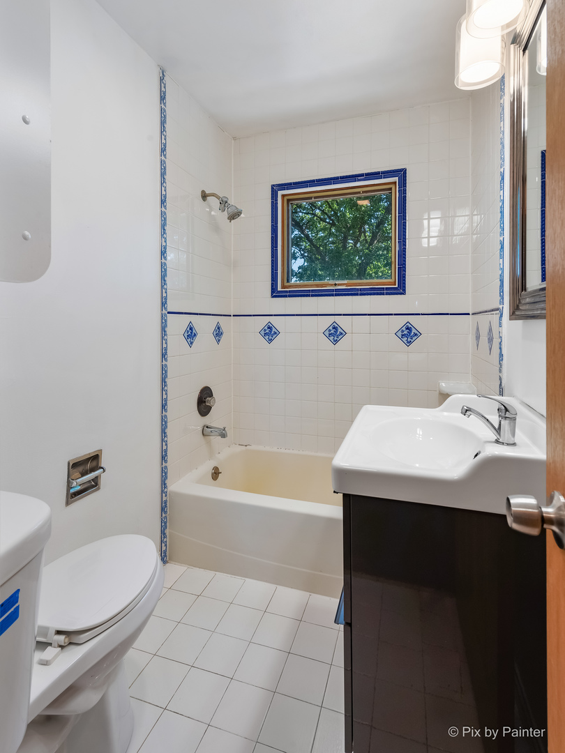 45W447 Lees Road Maple Park, IL 60151 - Photo 19 of 37 a bathroom with a sink a toilet and shower