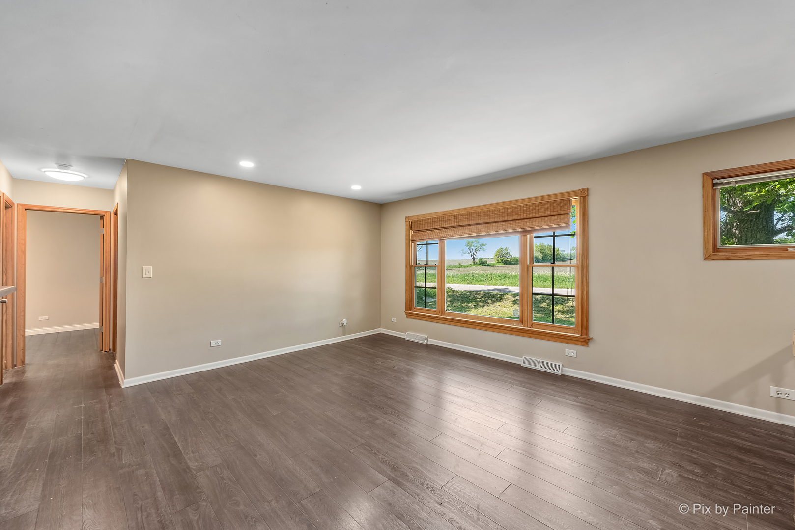 45W447 Lees Road Maple Park, IL 60151 - Photo 20 of 37 an empty room with wooden floor and windows