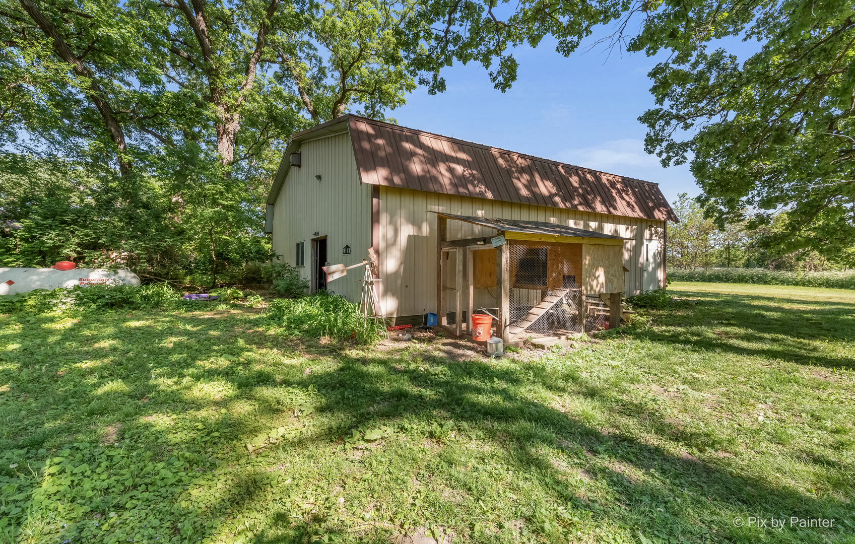 45W447 Lees Road Maple Park, IL 60151 - Photo 29 of 37 a view of a house with backyard porch and sitting area