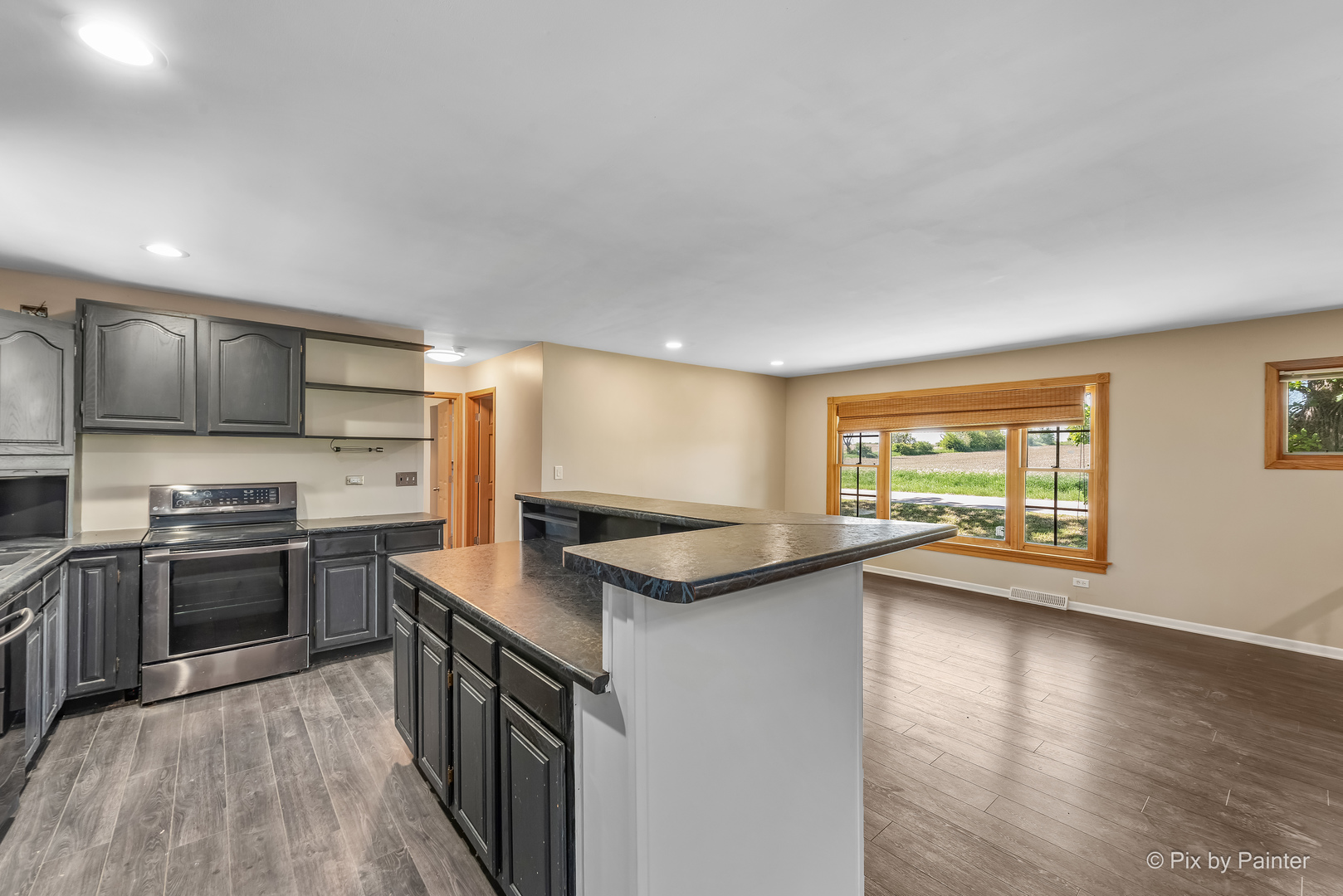 45W447 Lees Road Maple Park, IL 60151 - Photo 5 of 37 a kitchen with stainless steel appliances granite countertop a sink stove and refrigerator
