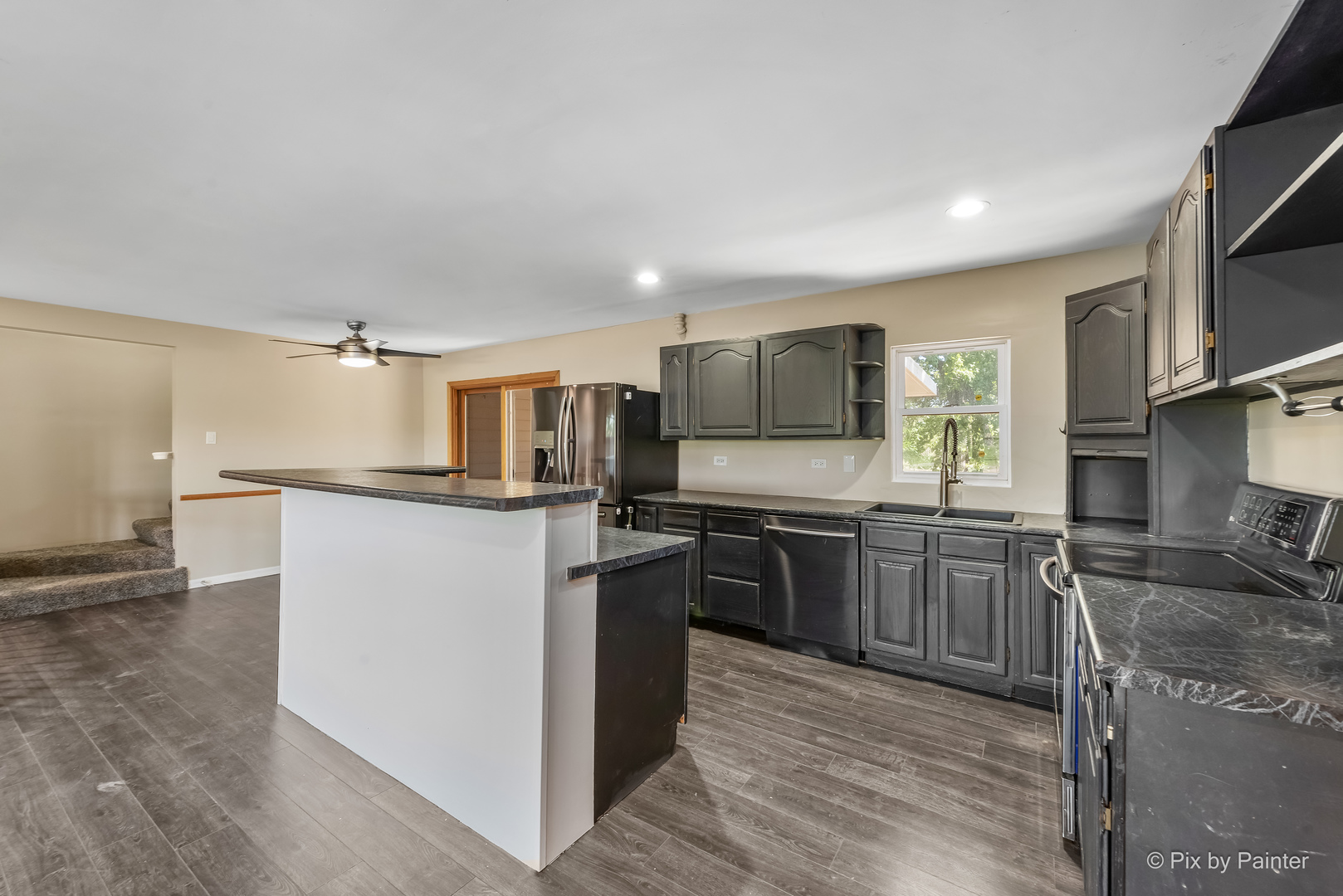 45W447 Lees Road Maple Park, IL 60151 - Photo 6 of 37 a kitchen with a sink stove and refrigerator