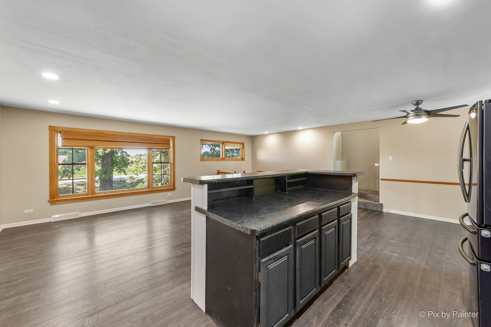 45W447 Lees Road Maple Park, IL 60151 - Photo 7 of 37 a kitchen with stainless steel appliances granite countertop a stove and a refrigerator