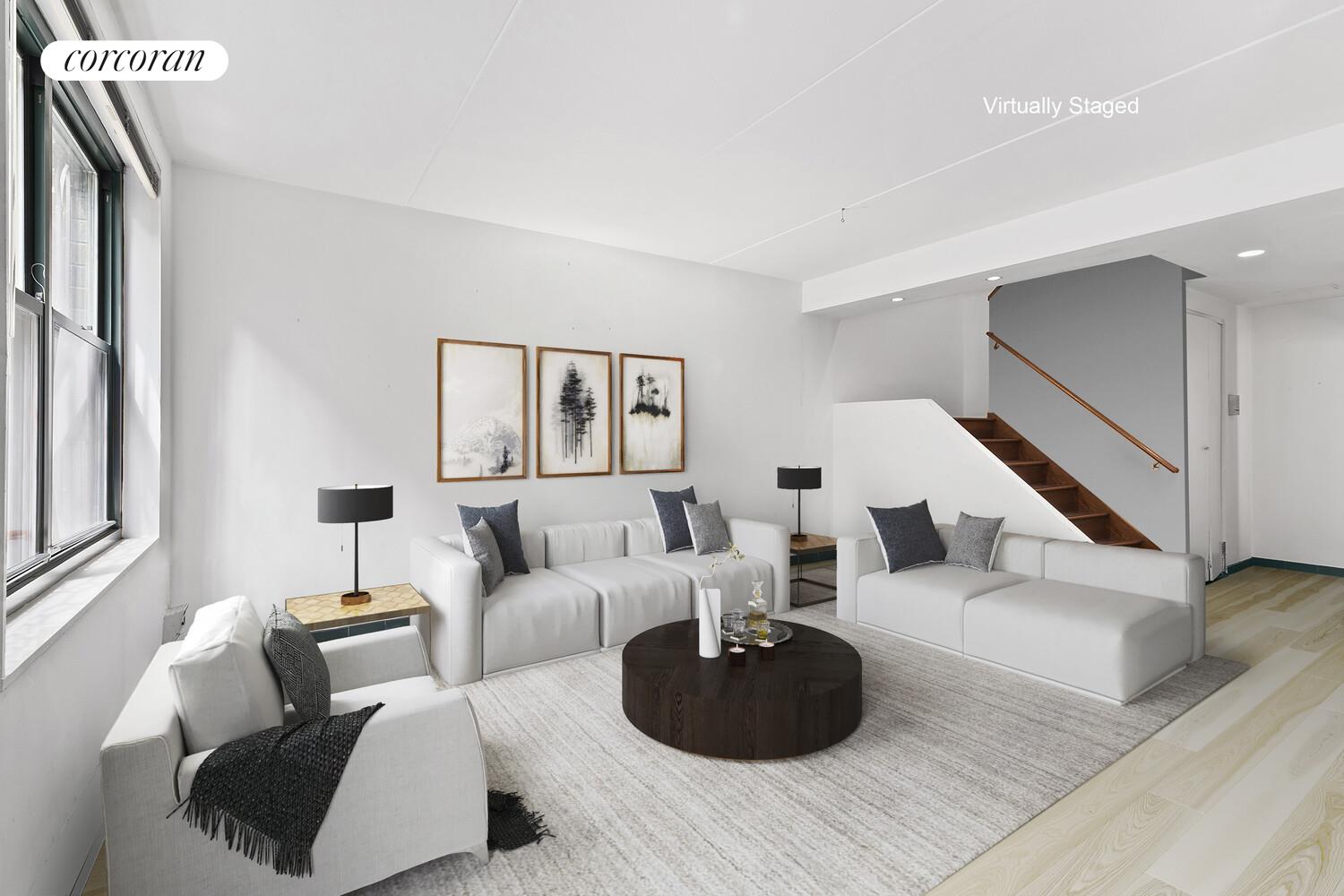 618 Washington Street, Unit GA Manhattan, NY 10014 - Photo 1 of 14 a living room with furniture and a wooden floor