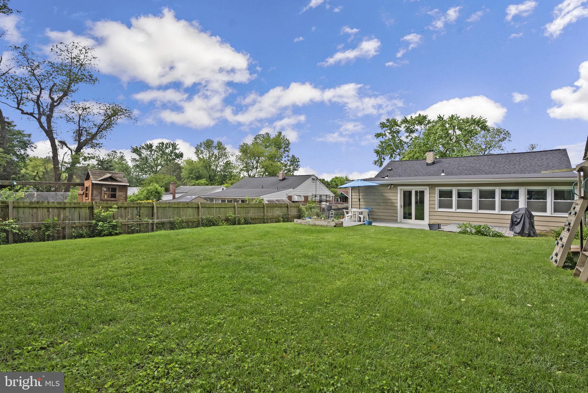12837 Flack Street Silver Spring, MD 20906 - Photo 25 of 26 a view of a house with a big yard