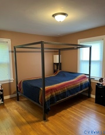 3732 Birdwood Road Richmond, VA 23234 - Photo 19 of 28 a bedroom with a bed and window