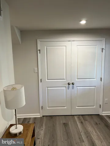 a view of a livingroom with wooden floor