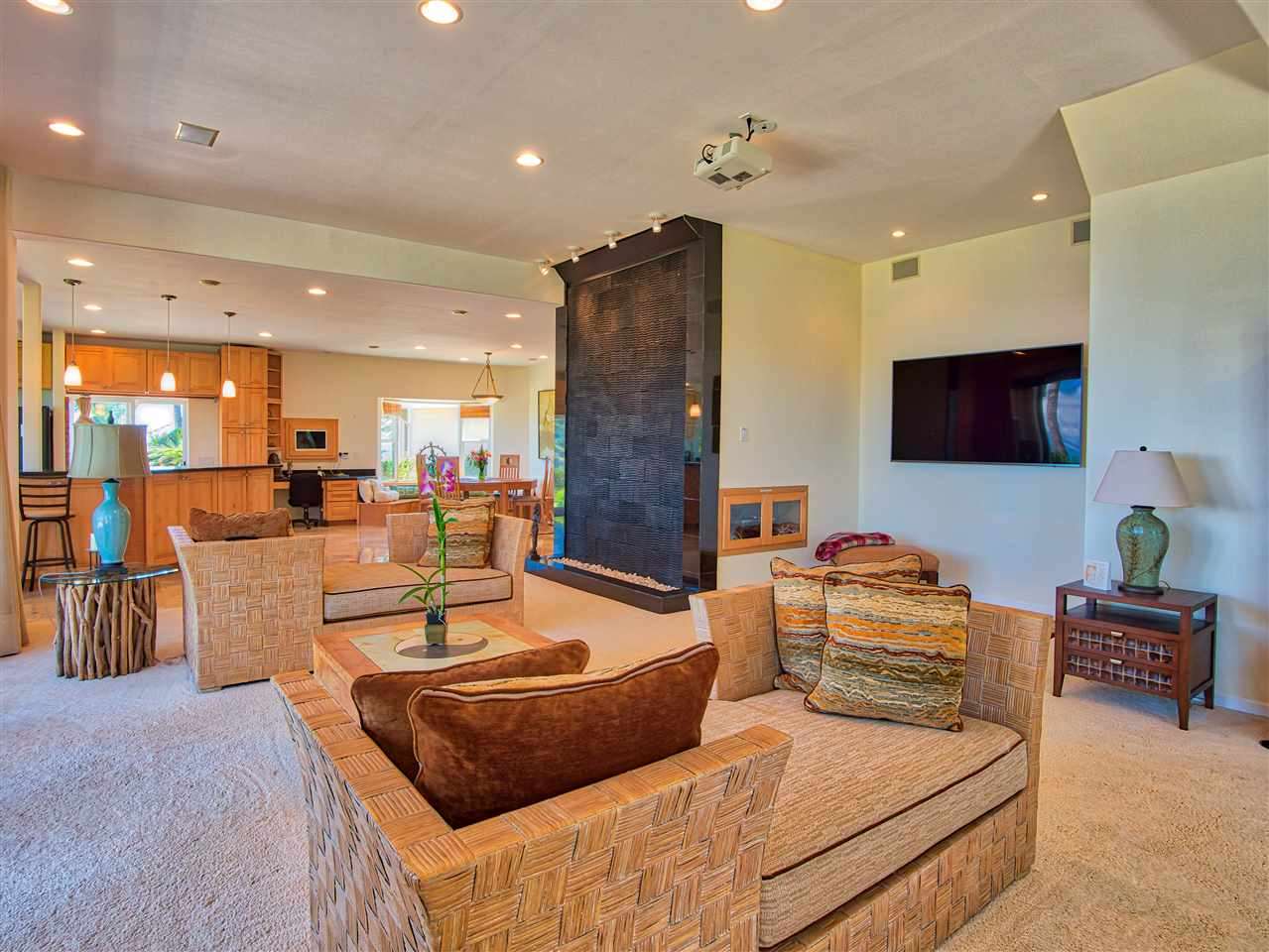 336 Door Of Faith Road Haiku, HI 96708 - Photo 11 of 30 a living room with furniture and a flat screen tv