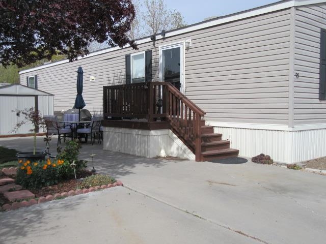 3251 E Road, Unit 99 Clifton, CO 81520 - Photo 5 of 25 a view of backyard with sitting area