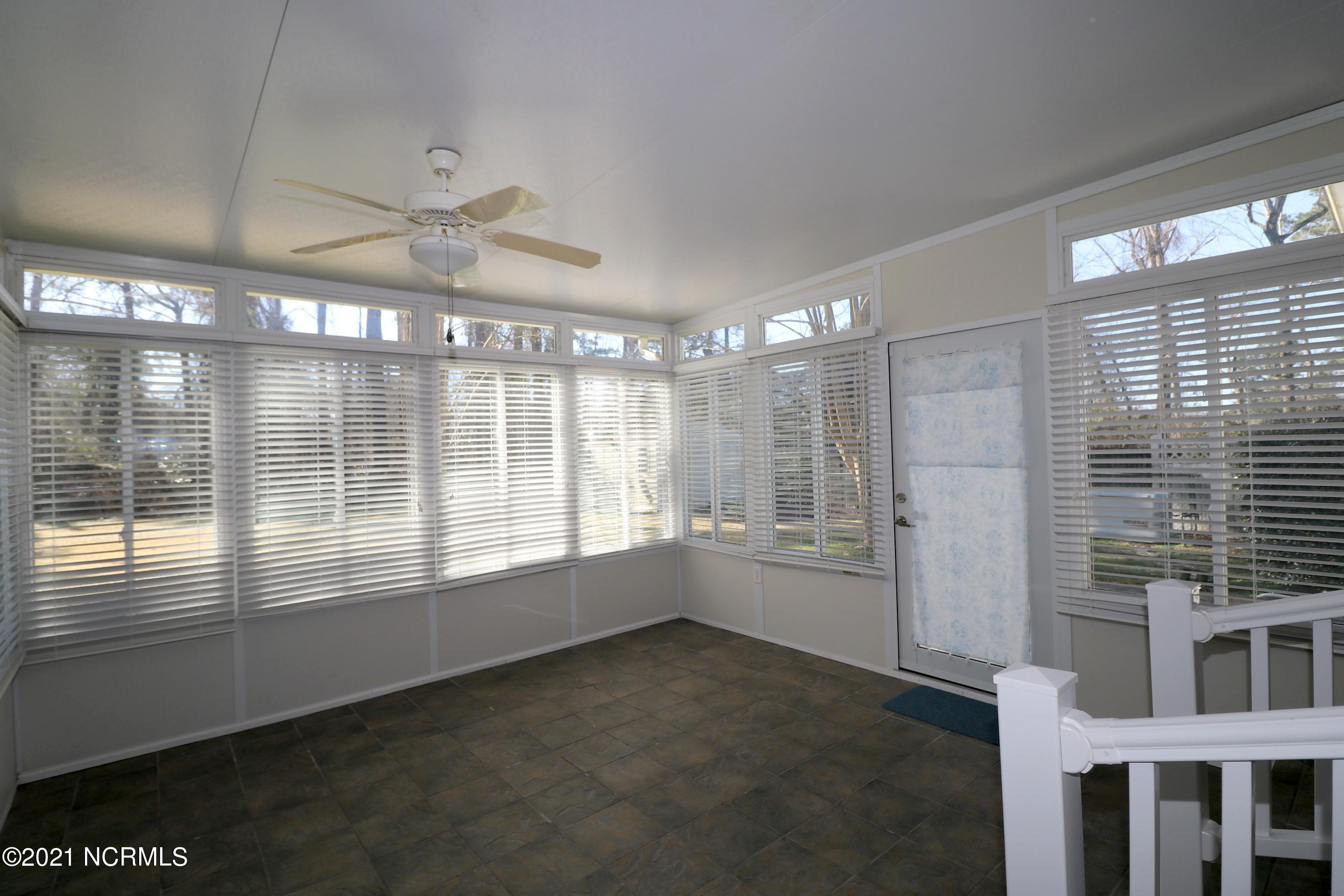 90 Sterling Road Jacksonville, NC 28546 - Photo 32 of 37 Enclosed Sun Room