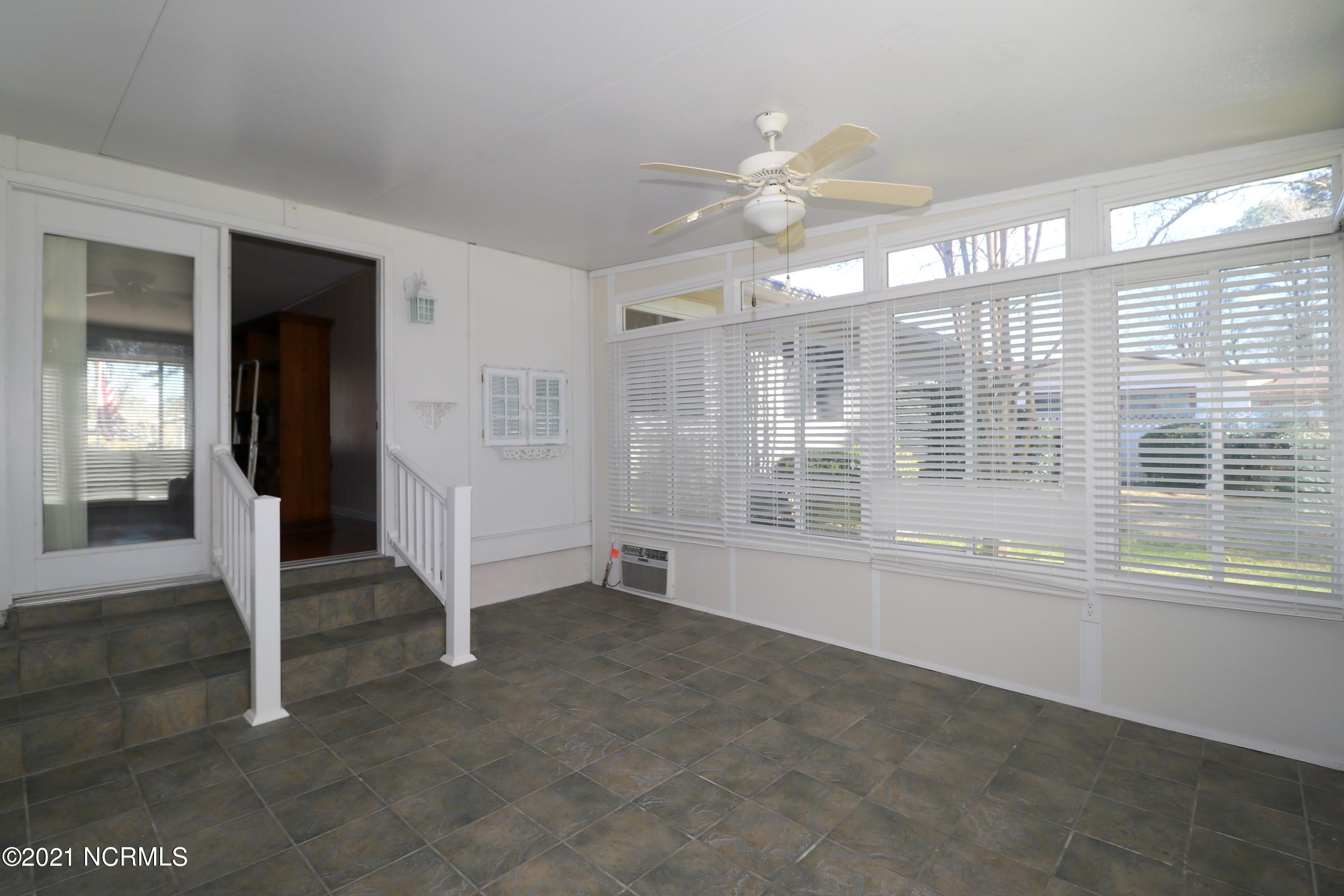 90 Sterling Road Jacksonville, NC 28546 - Photo 33 of 37 Enclosed Sun Room