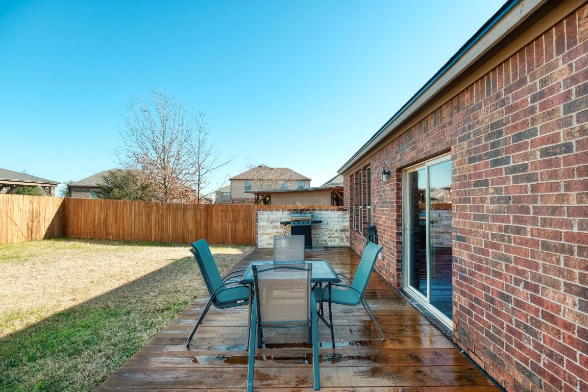 1244 Yellow Iris Road Leander, TX 78641 - Photo 24 of 25 a patio with table and chairs