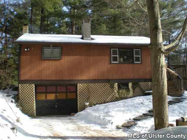 106 Rudy Frank Road Shandaken, NY 12480 - Photo 4 of 4 a front view of a house with parking