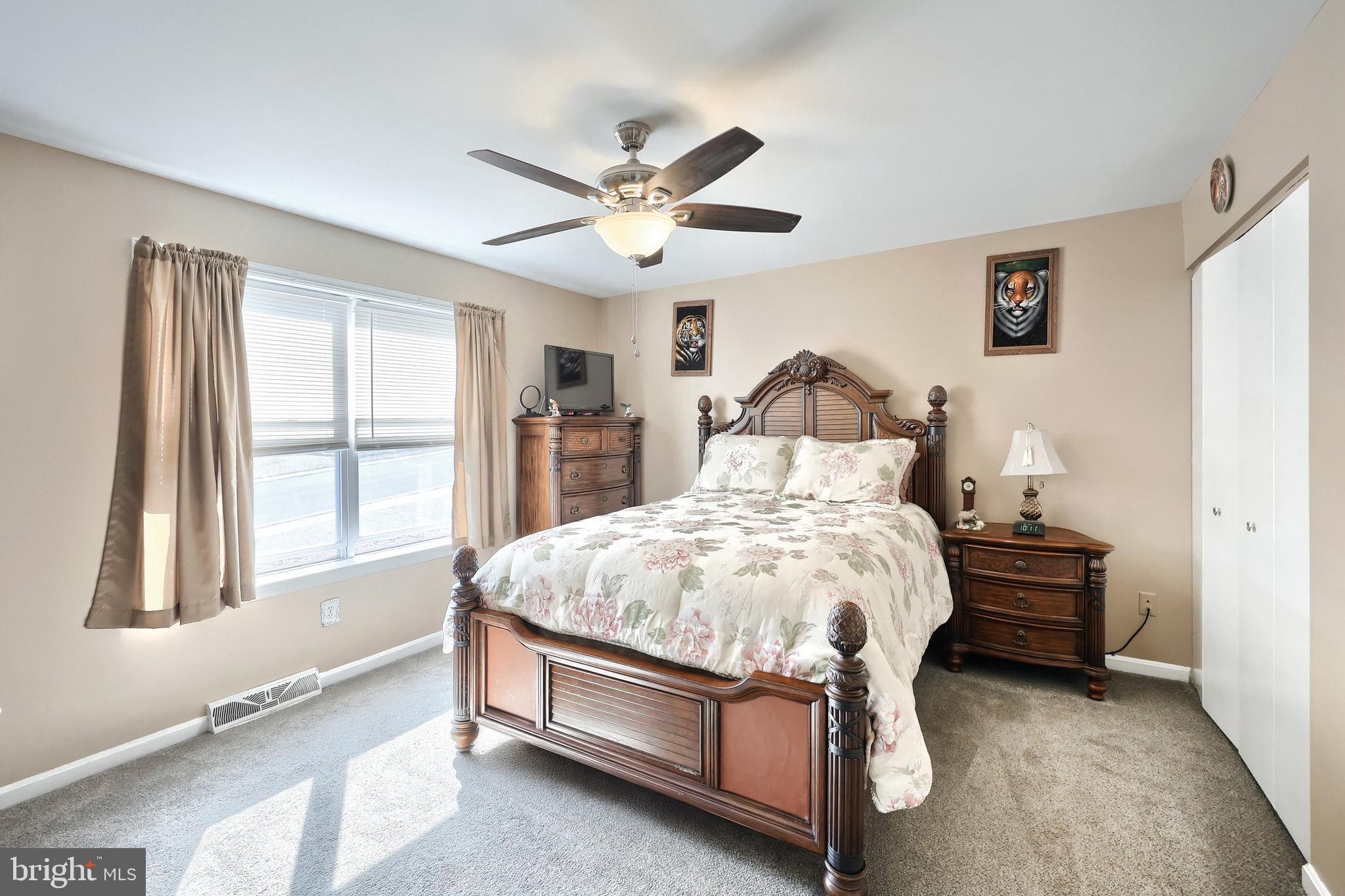 225 Edinburgh Road York, PA 17406 - Photo 16 of 40 a bed room with a bed and a window