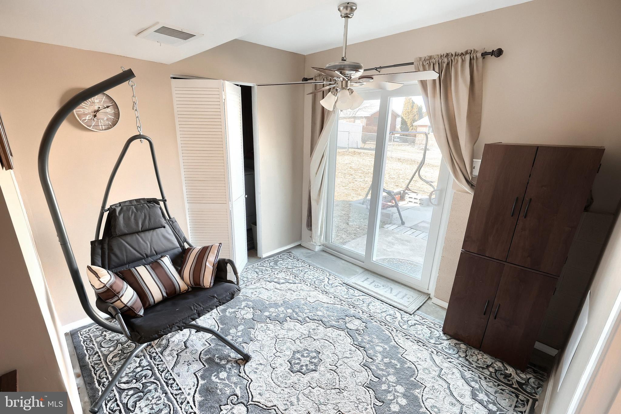 225 Edinburgh Road York, PA 17406 - Photo 23 of 40 a living room with furniture and a window