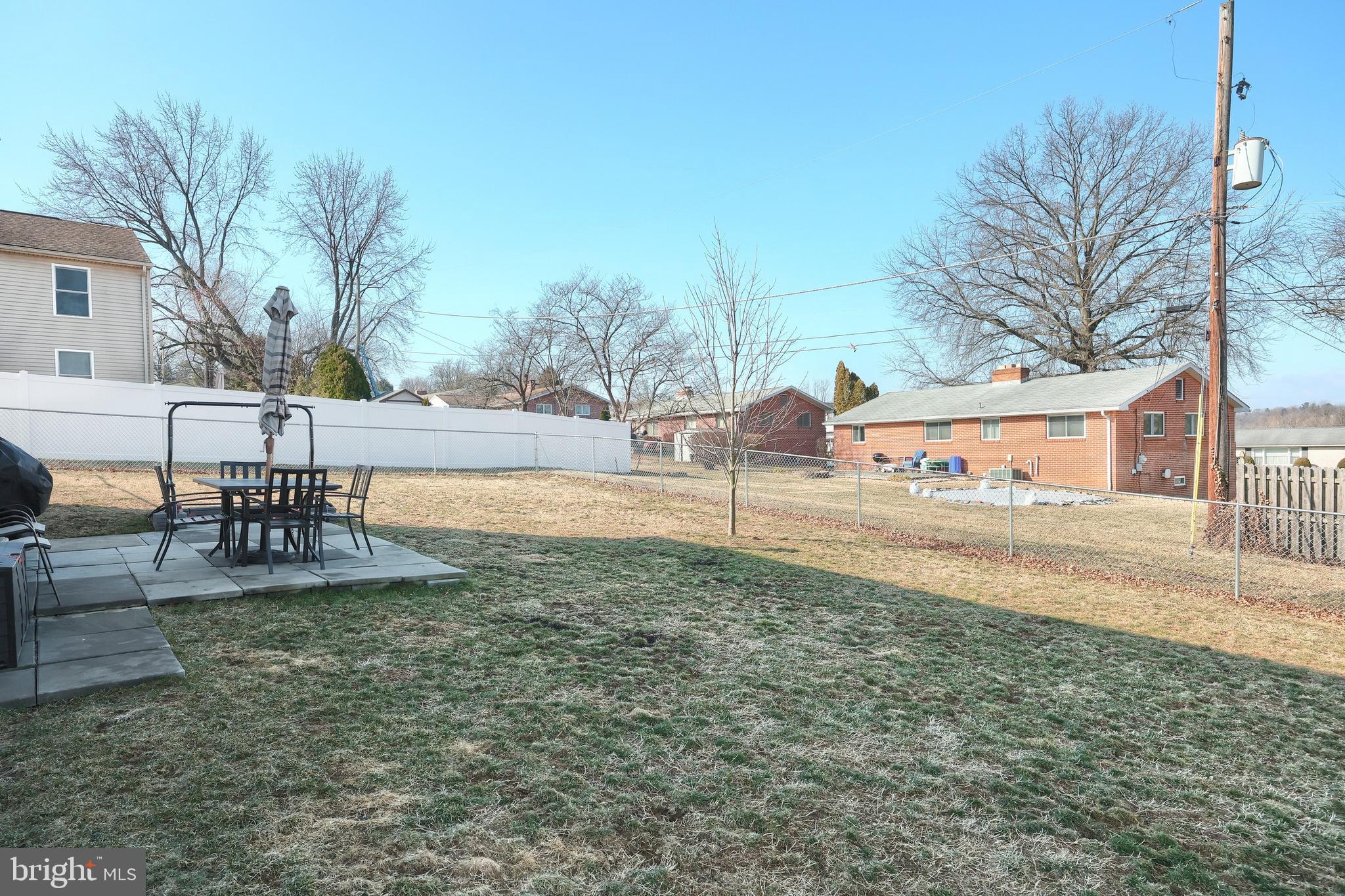 225 Edinburgh Road York, PA 17406 - Photo 30 of 40 a view of a yard with table and chairs