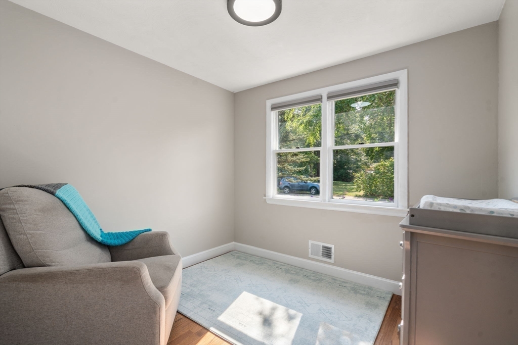 19 Wellesley Road Natick, MA 01760 - Photo 17 of 23 a living room with furniture and a window