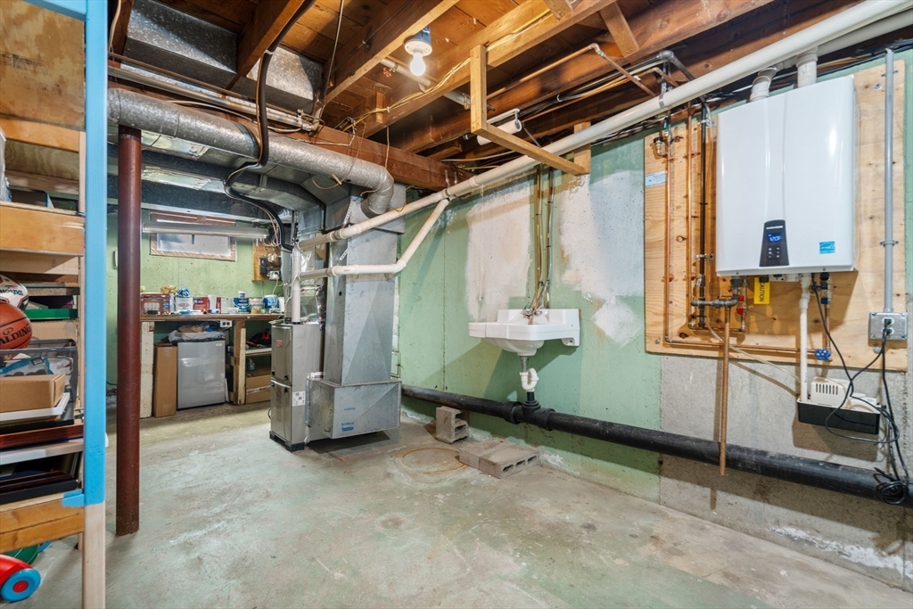 19 Wellesley Road Natick, MA 01760 - Photo 21 of 23 a view of storage and utility room