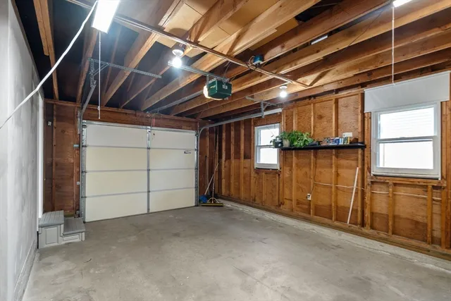 a view of a room with wooden walls