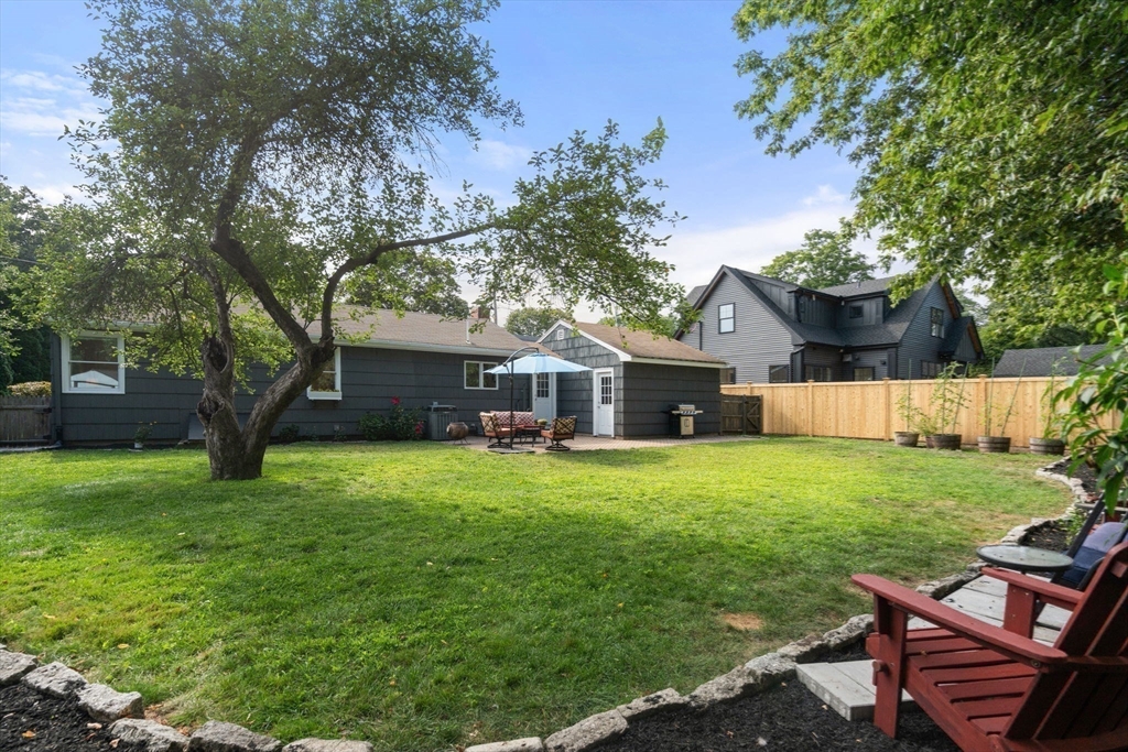 19 Wellesley Road Natick, MA 01760 - Photo 4 of 23 a front view of a house with garden