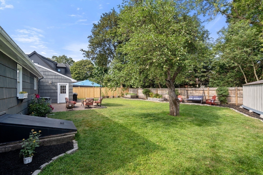19 Wellesley Road Natick, MA 01760 - Photo 5 of 23 a view of a house with backyard and sitting area