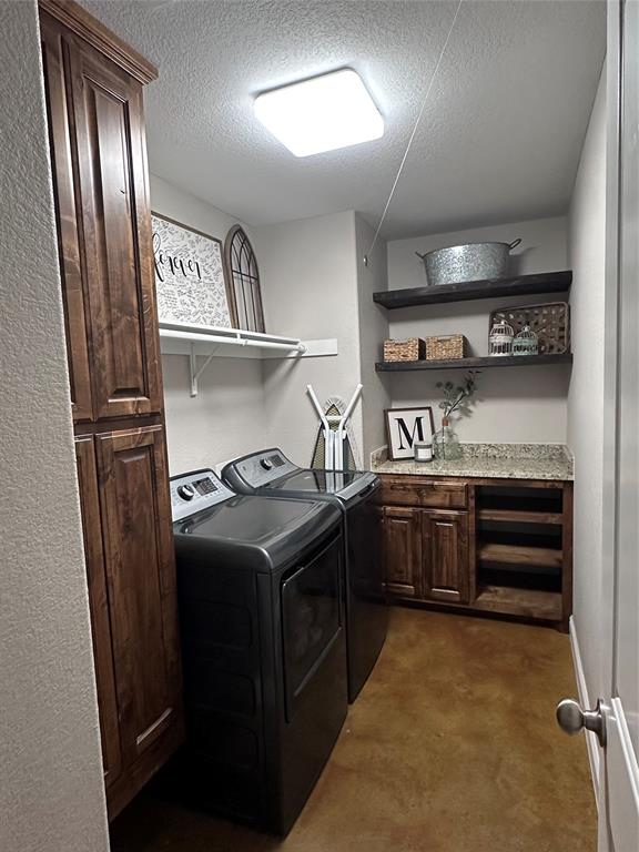 1212 Bowman Ridge Road Stephenville, TX 76401 - Photo 15 of 23 a kitchen with stainless steel appliances granite countertop a stove a refrigerator and a refrigerator