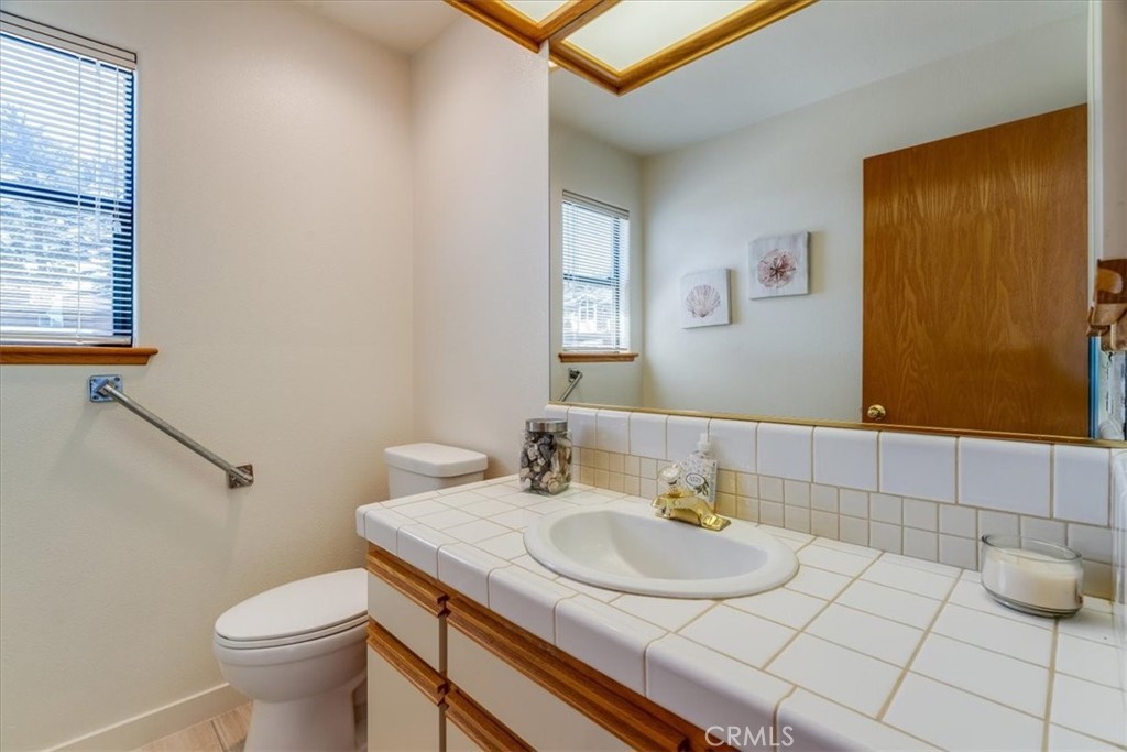 390 Lampton Street Cambria, CA 93428 - Photo 42 of 68 This is the powder room located on the second floor near the living area.