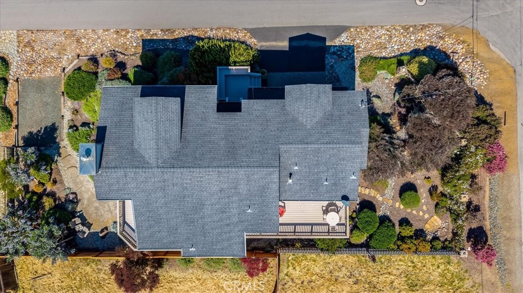 390 Lampton Street Cambria, CA 93428 - Photo 61 of 68 Notice the extra parking area on the left side of the photo. That is the west side of the home.