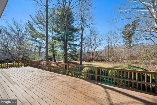 a view of a wooden floor with a trees