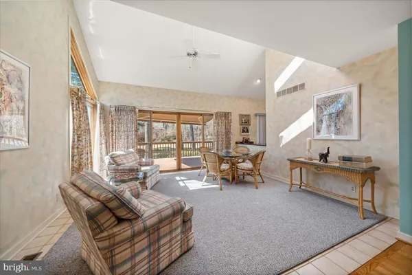 a living room with furniture and a table
