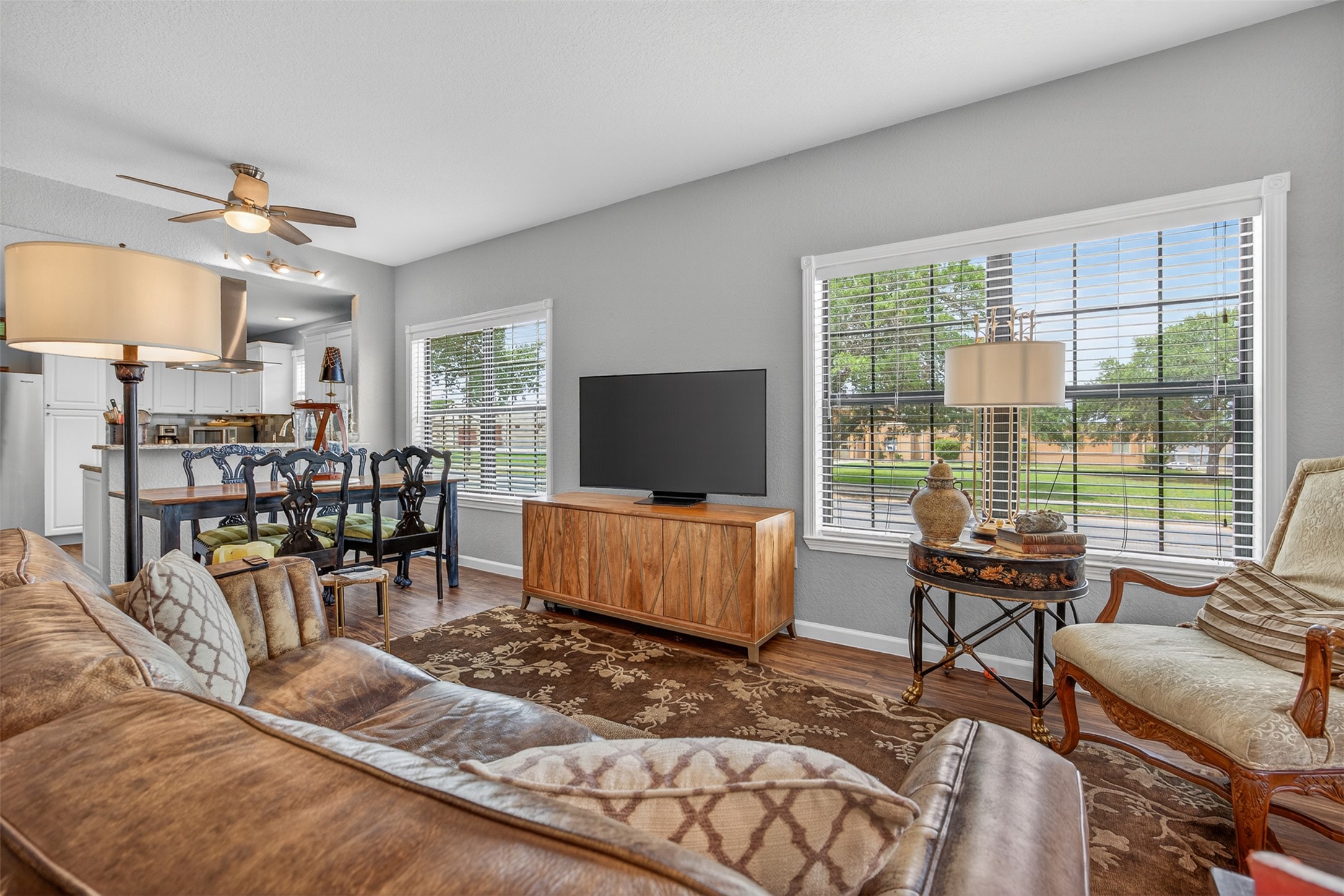 217 Walnut Avenue Luling, TX 78648 - Photo 5 of 38 a living room with furniture and a flat screen tv