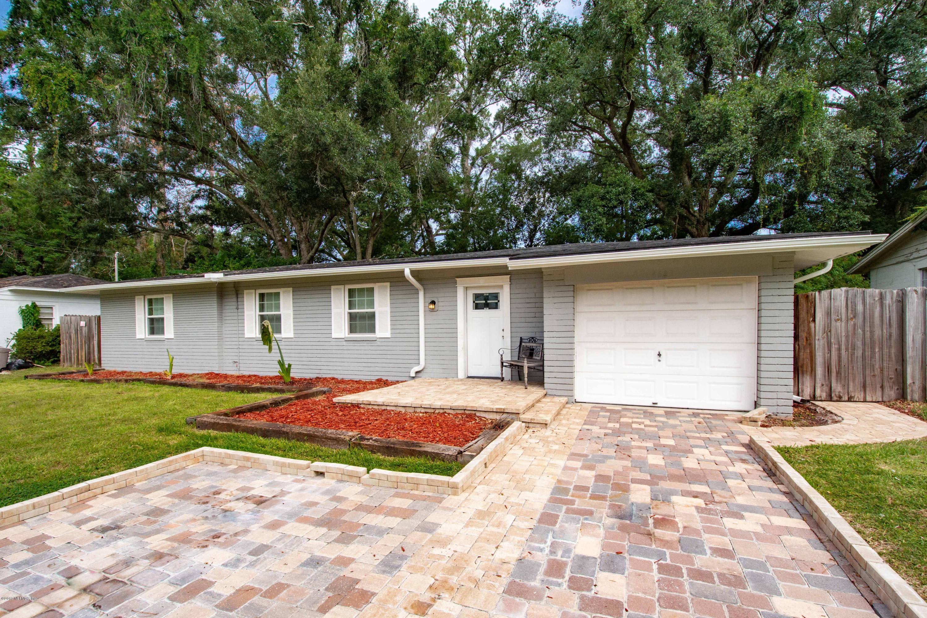 4623 Martingale Road Jacksonville, FL 32210 - Photo 1 of 18 a view of a house with a yard