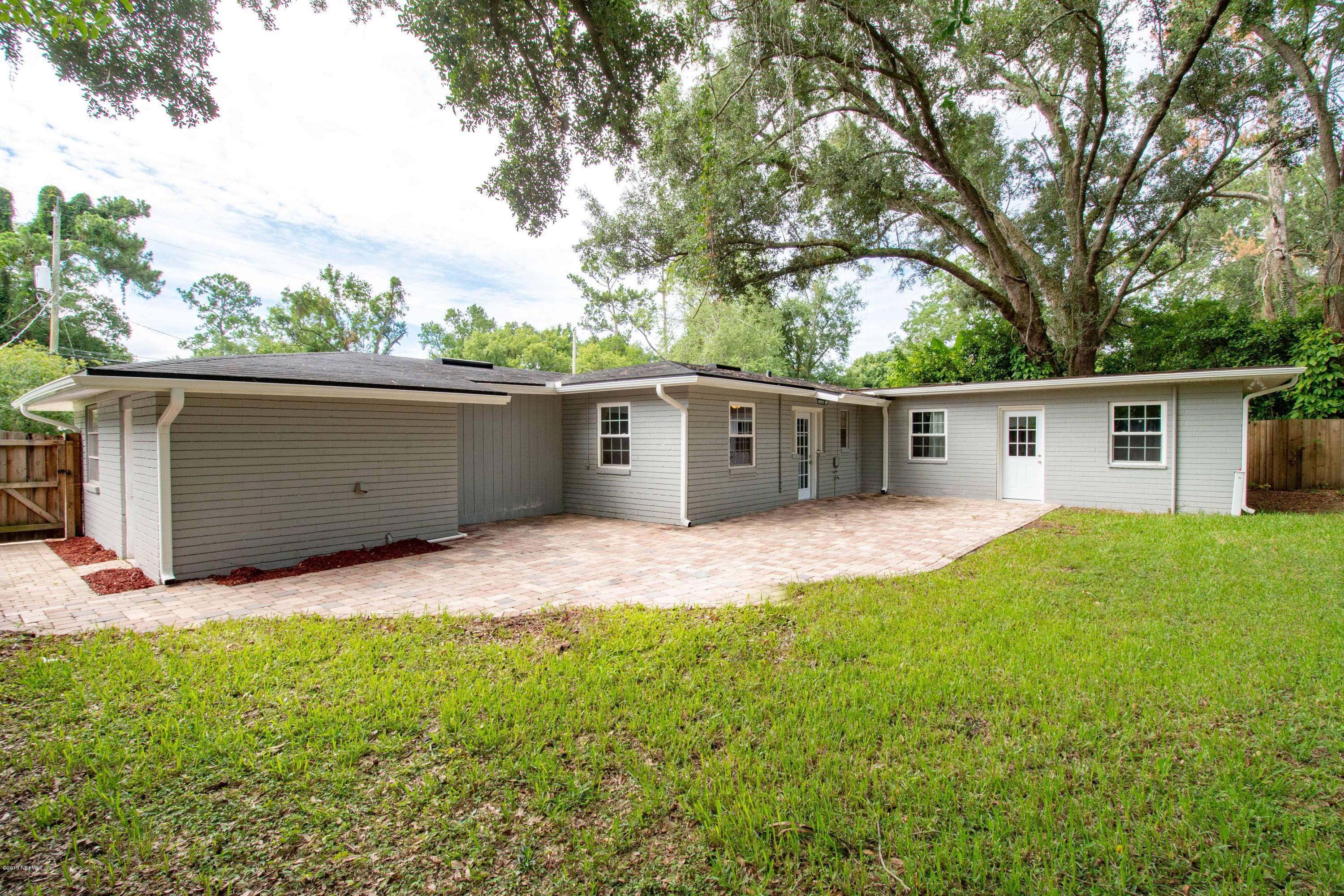 4623 Martingale Road Jacksonville, FL 32210 - Photo 18 of 18 front view of a house with a yard