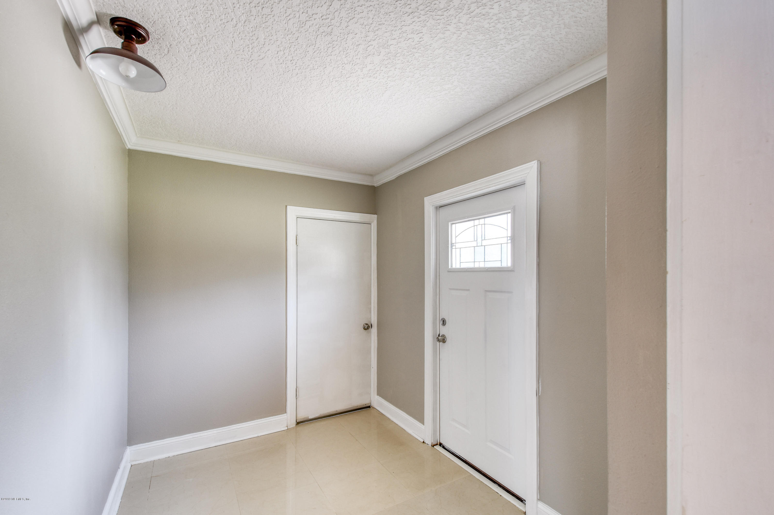 4623 Martingale Road Jacksonville, FL 32210 - Photo 4 of 18 a view of an empty room