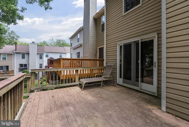 an aerial view of a house with yard