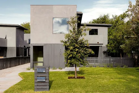 a house view with a garden space
