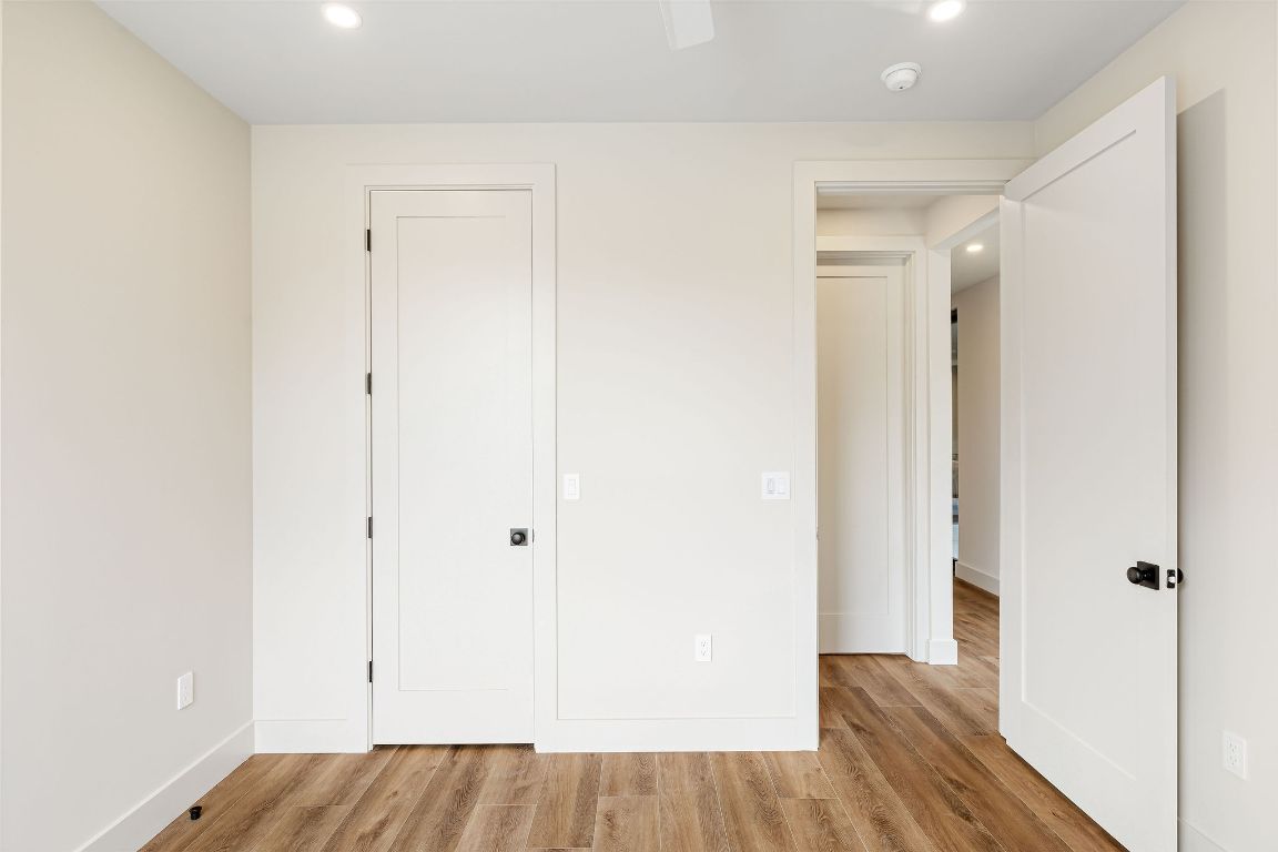 4412 Banister Lane, Unit 1 Austin, TX 78745 - Photo 20 of 40 a view of hallway with wooden floor