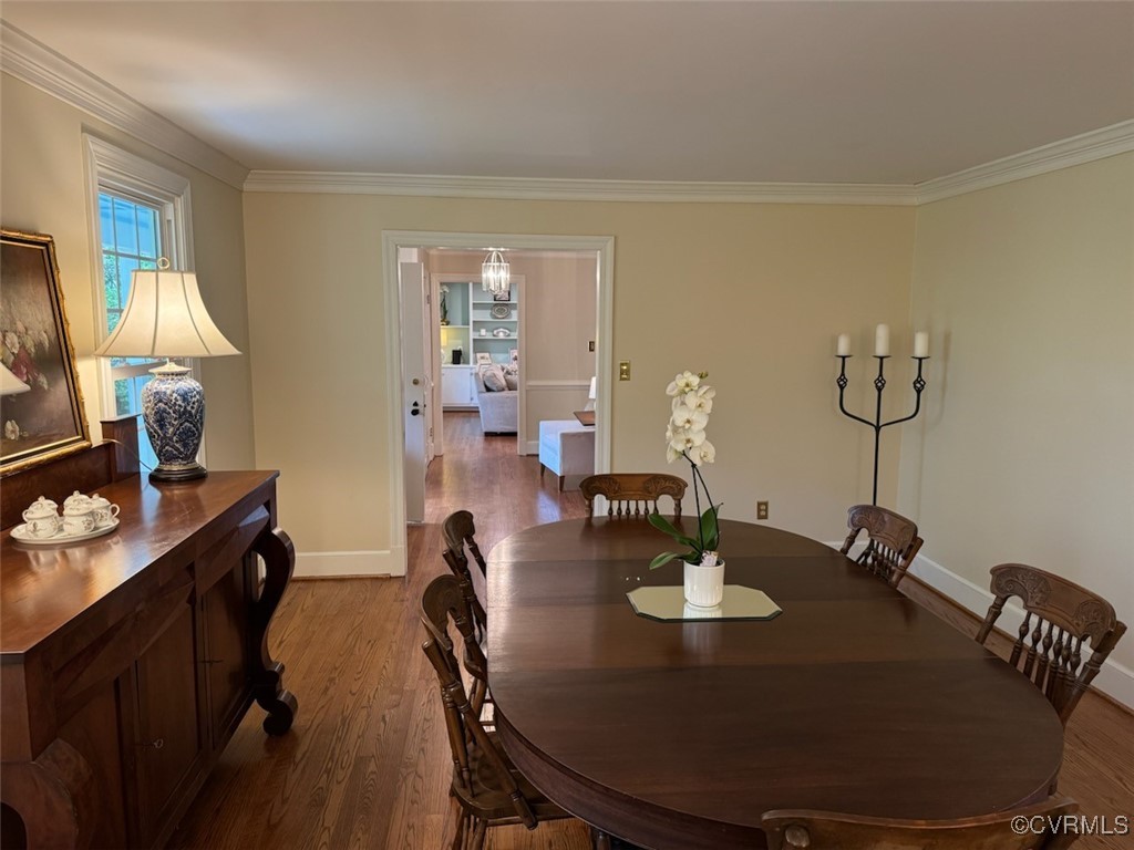 209 Running Cedar Lane Henrico, VA 23229 - Photo 13 of 29 a view of a dining room with furniture and wooden floor