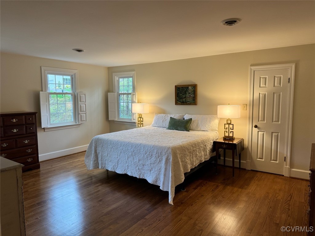 209 Running Cedar Lane Henrico, VA 23229 - Photo 23 of 29 a bedroom with a bed and wooden floor
