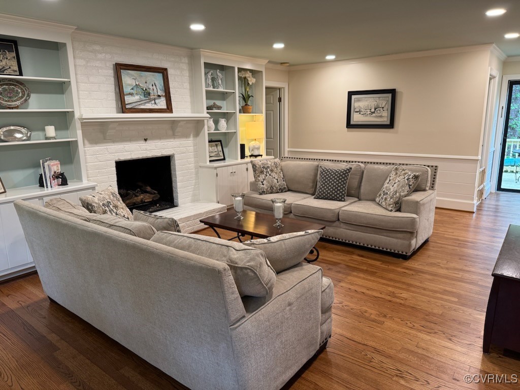 209 Running Cedar Lane Henrico, VA 23229 - Photo 3 of 29 a living room with furniture and a fireplace