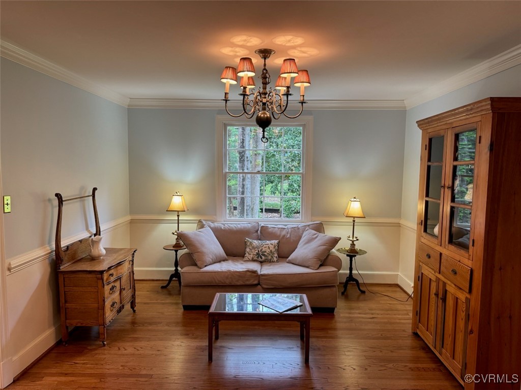 209 Running Cedar Lane Henrico, VA 23229 - Photo 10 of 29 a living room with furniture and a chandelier