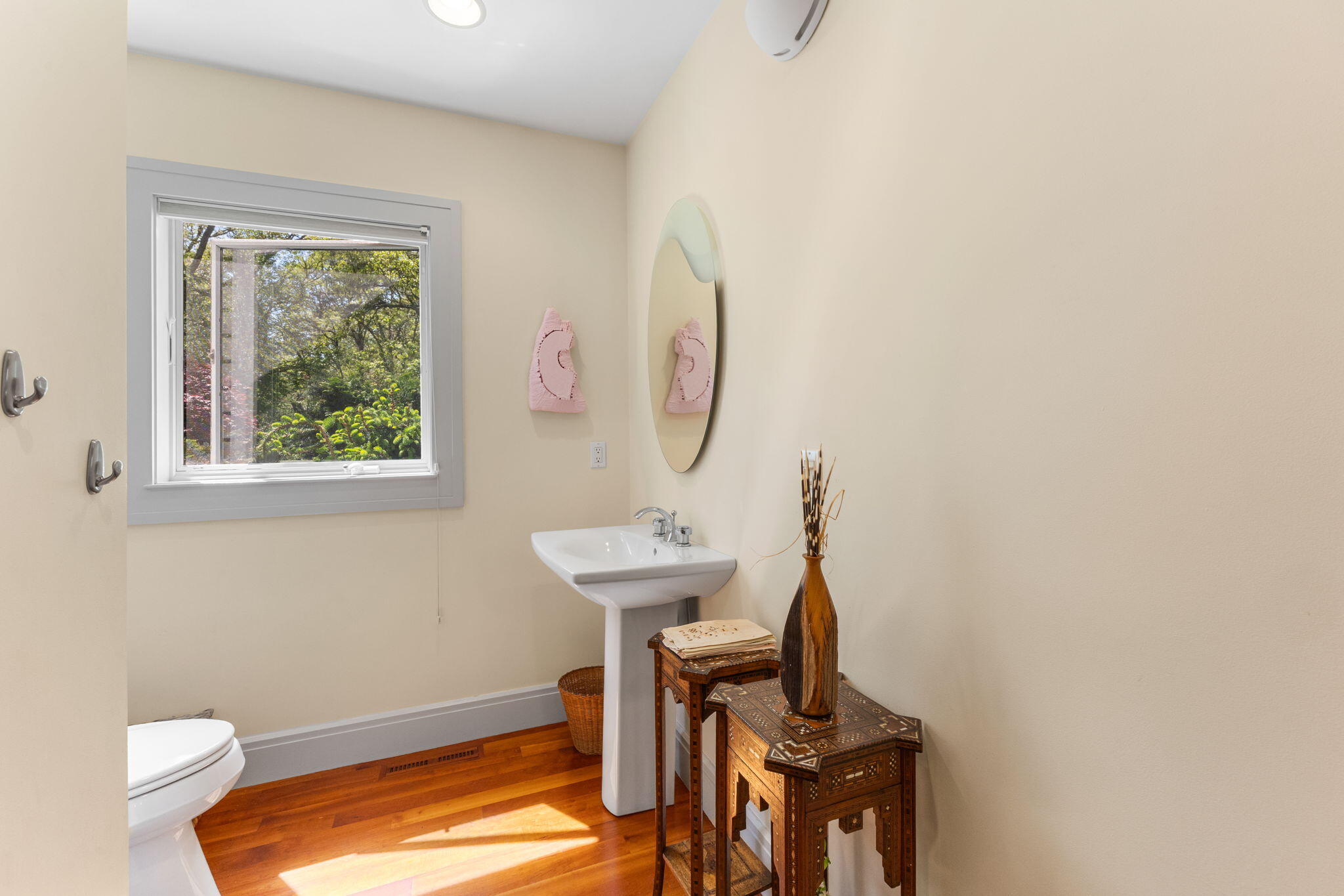 476 Baxter Neck Road Marstons Mills, MA 02648 - Photo 41 of 95 a bathroom with a sink a toilet and a window