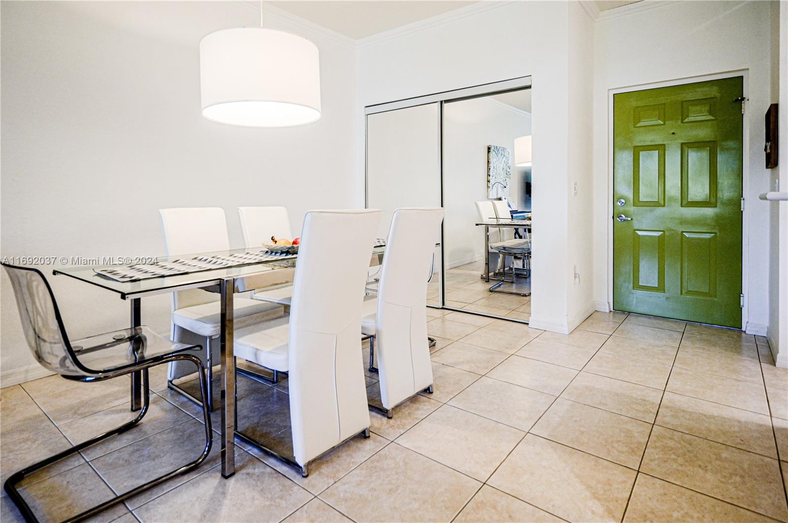 75 Gulfstream Road, Unit 107B Dania Beach, FL 33004 - Photo 23 of 71 a kitchen with stainless steel appliances granite countertop a refrigerator and a sink