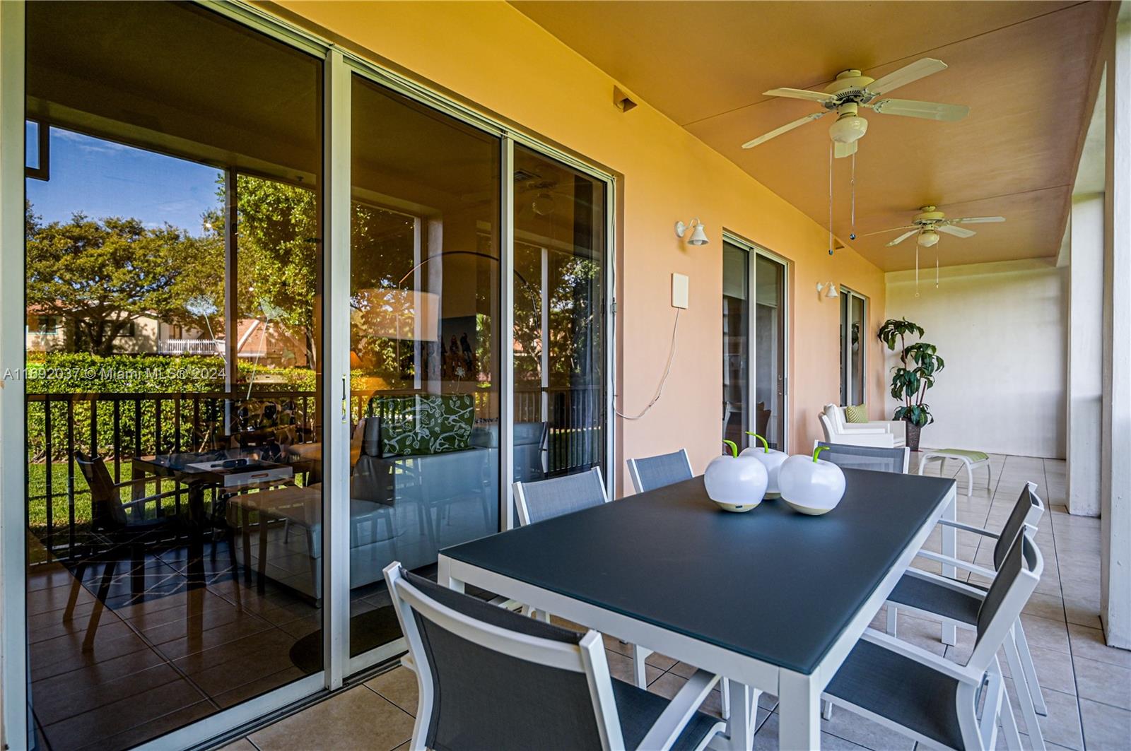 75 Gulfstream Road, Unit 107B Dania Beach, FL 33004 - Photo 26 of 71 a dining room with furniture and wooden floor