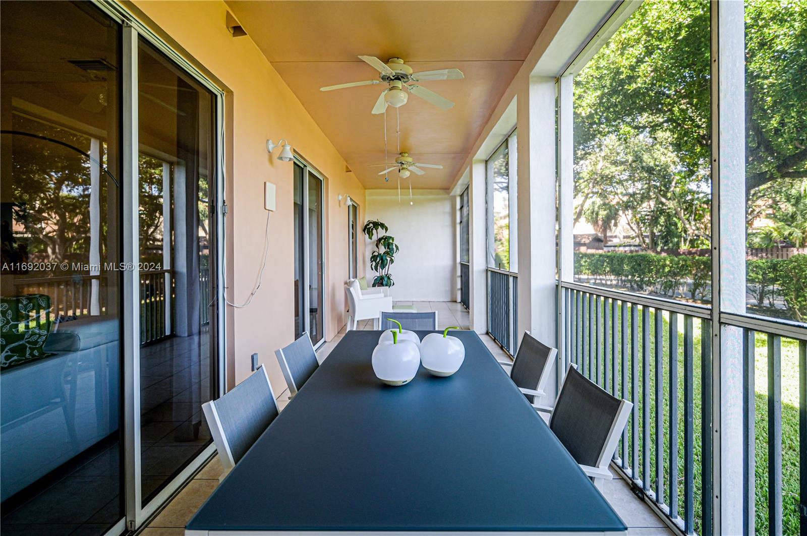 75 Gulfstream Road, Unit 107B Dania Beach, FL 33004 - Photo 30 of 71 a view of a balcony filled with furniture and a potted plant