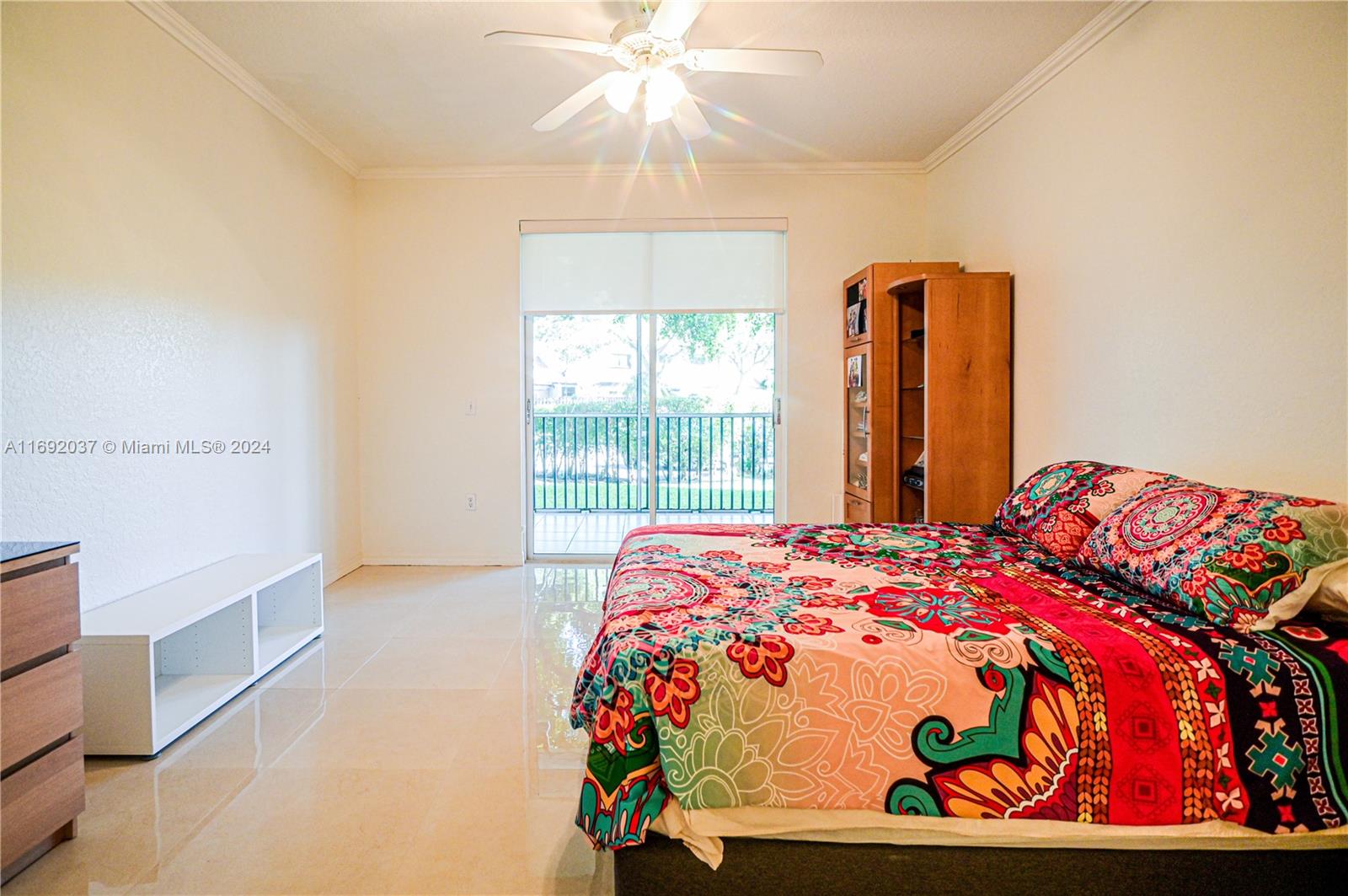 75 Gulfstream Road, Unit 107B Dania Beach, FL 33004 - Photo 42 of 71 a bedroom with a bed and a window