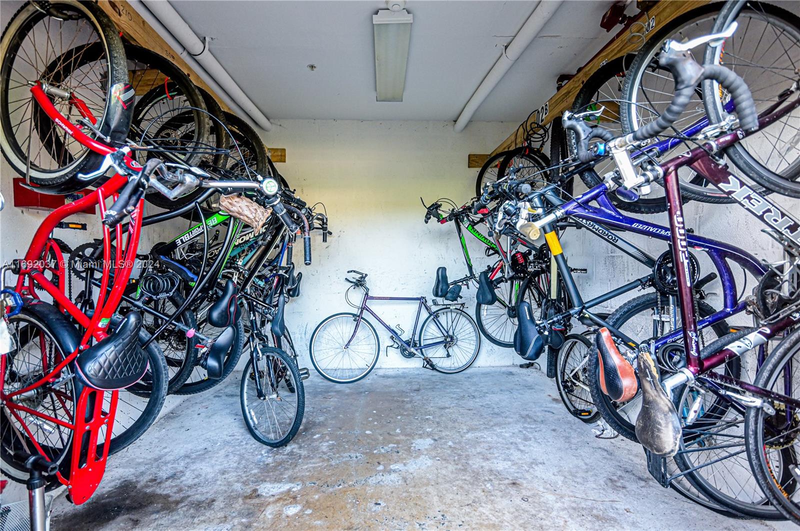 75 Gulfstream Road, Unit 107B Dania Beach, FL 33004 - Photo 56 of 71 a view of a bike storage with bicycles