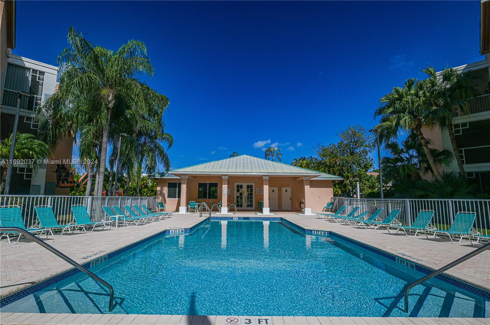 75 Gulfstream Road, Unit 107B Dania Beach, FL 33004 - Photo 58 of 71 a view of a house with backyard porch and sitting area